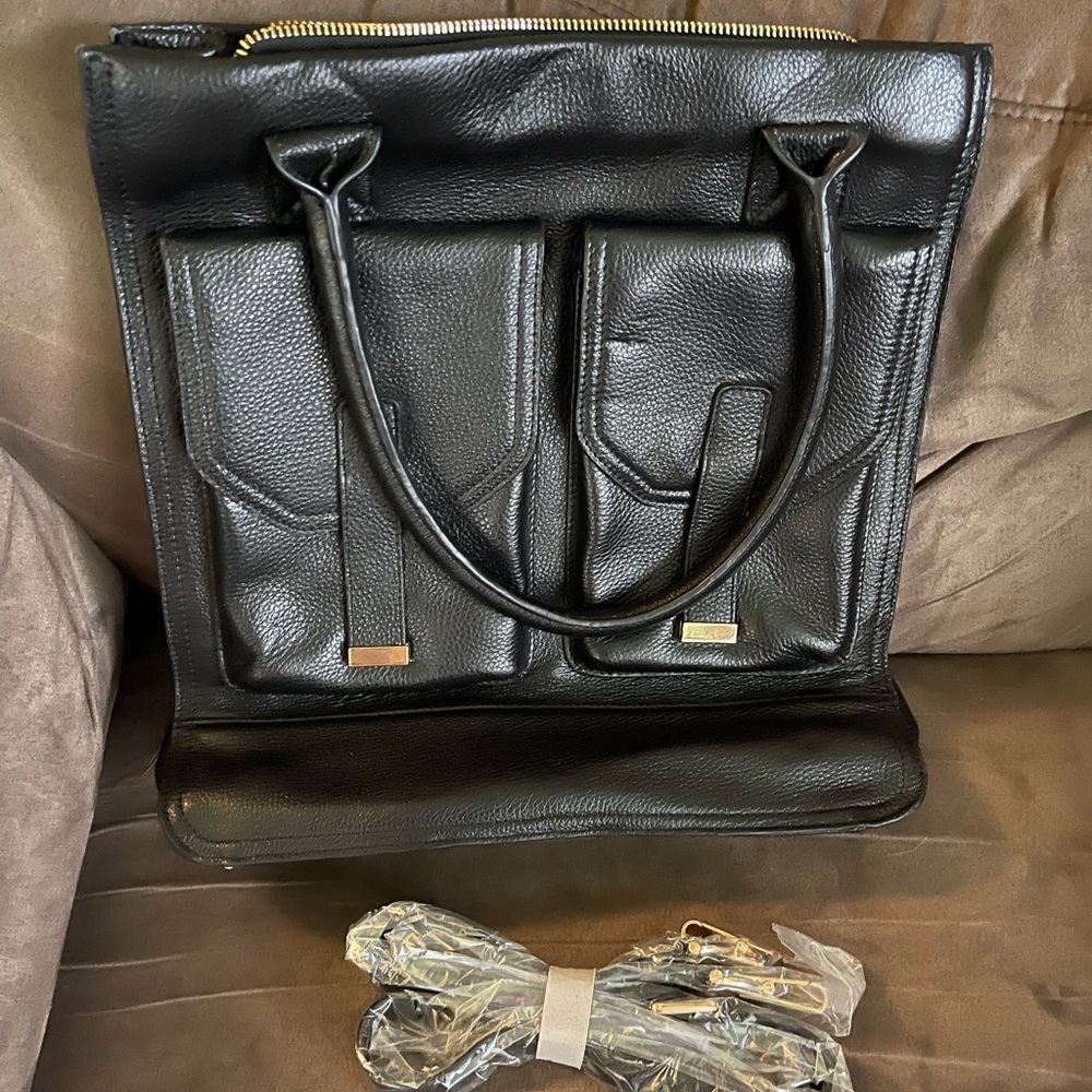 Kristen bell for Erica Anenberg large satchel type handbag